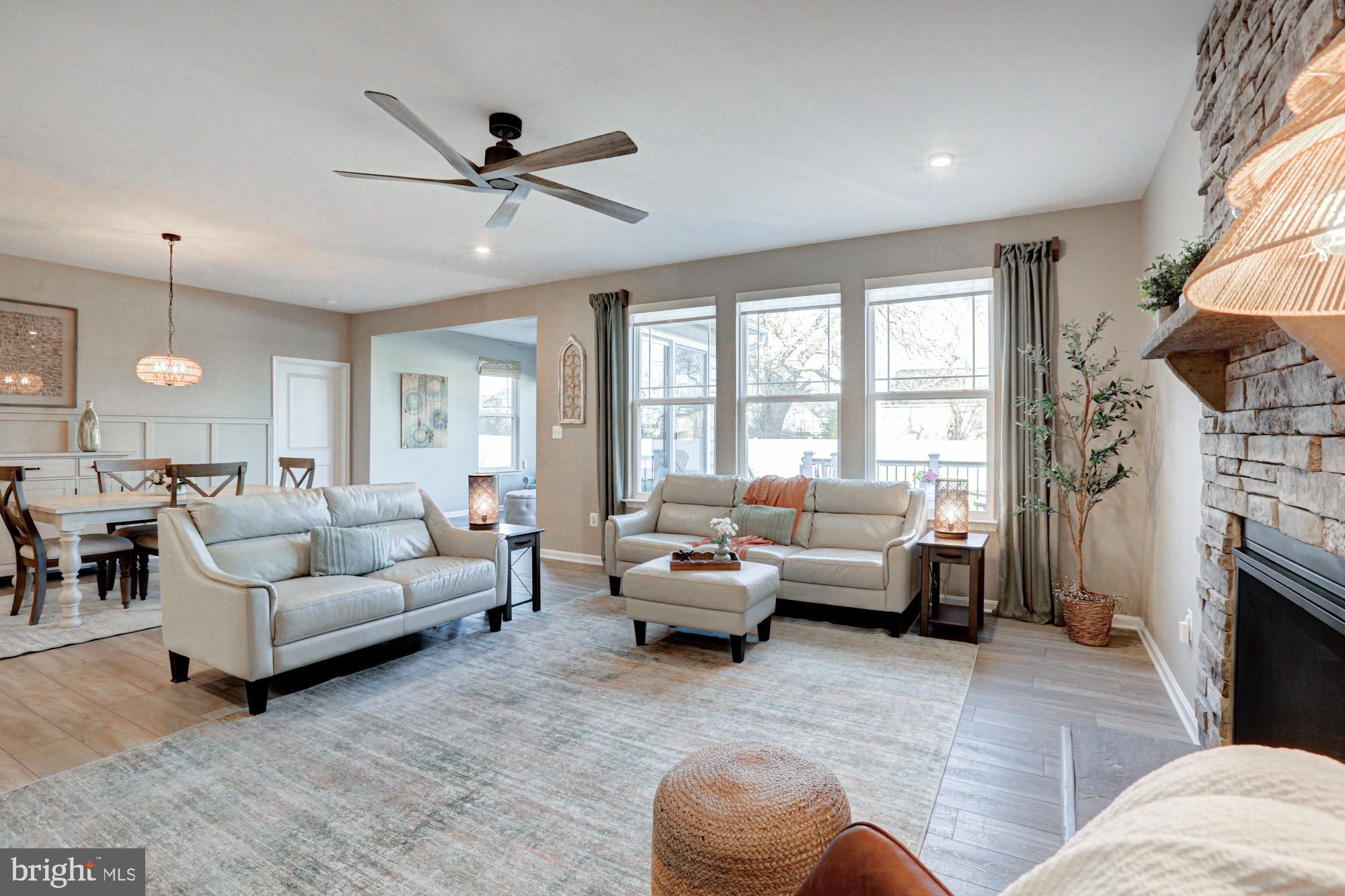507 Cherry Bark Road Middletown, DE 19709 - Photo 34 of 81 a living room with furniture and a fireplace