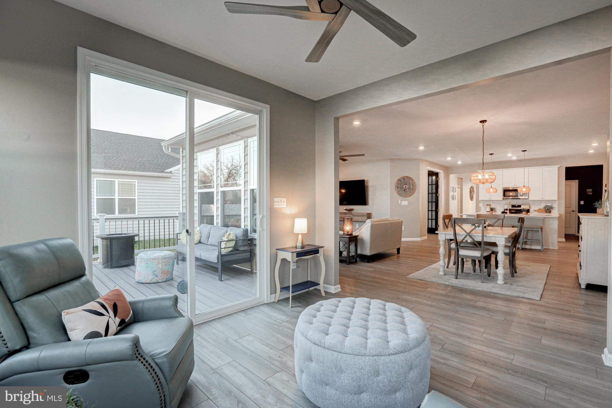 507 Cherry Bark Road Middletown, DE 19709 - Photo 36 of 81 a living room with furniture and a large window