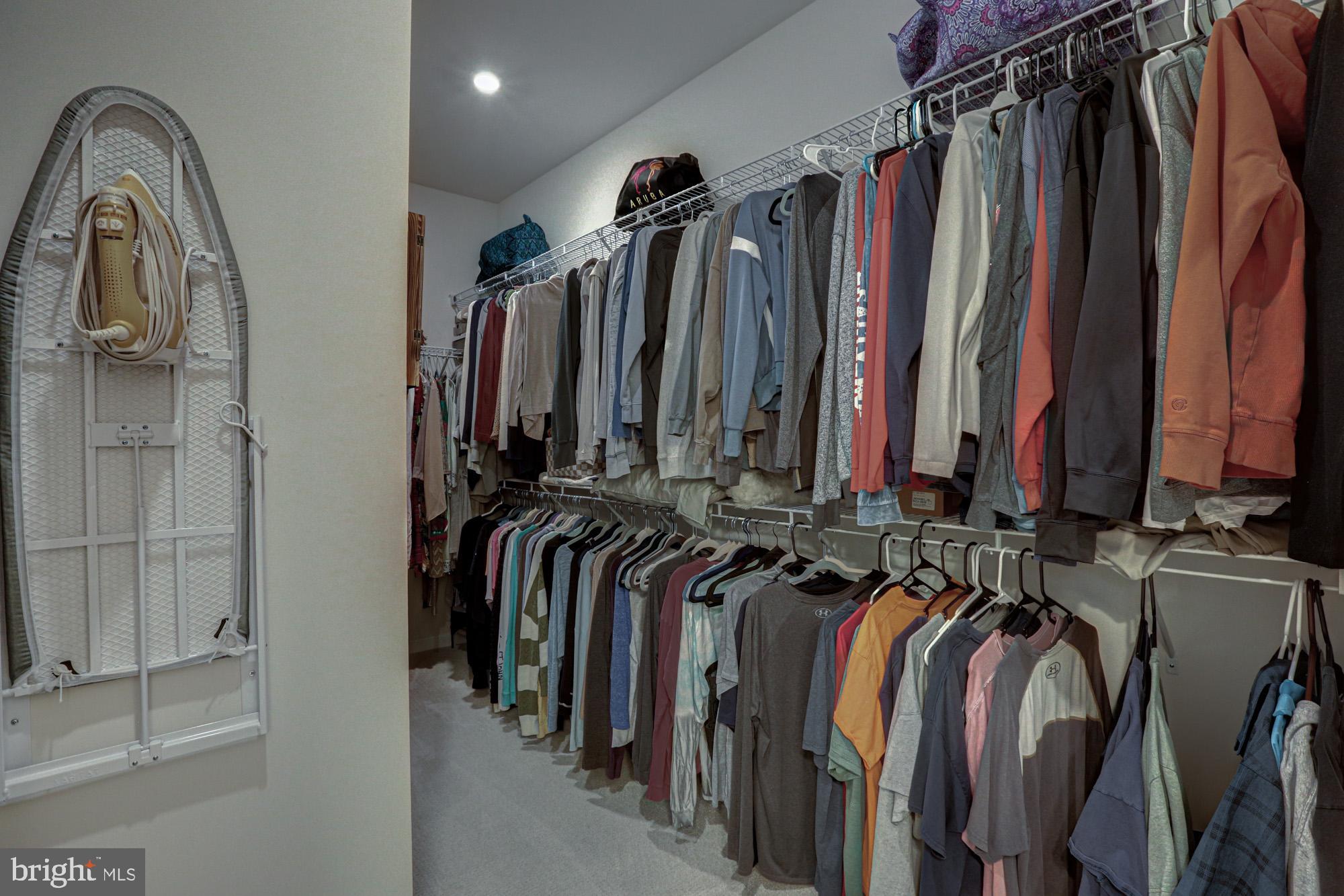 507 Cherry Bark Road Middletown, DE 19709 - Photo 48 of 81 a view of walk in closet with clothes
