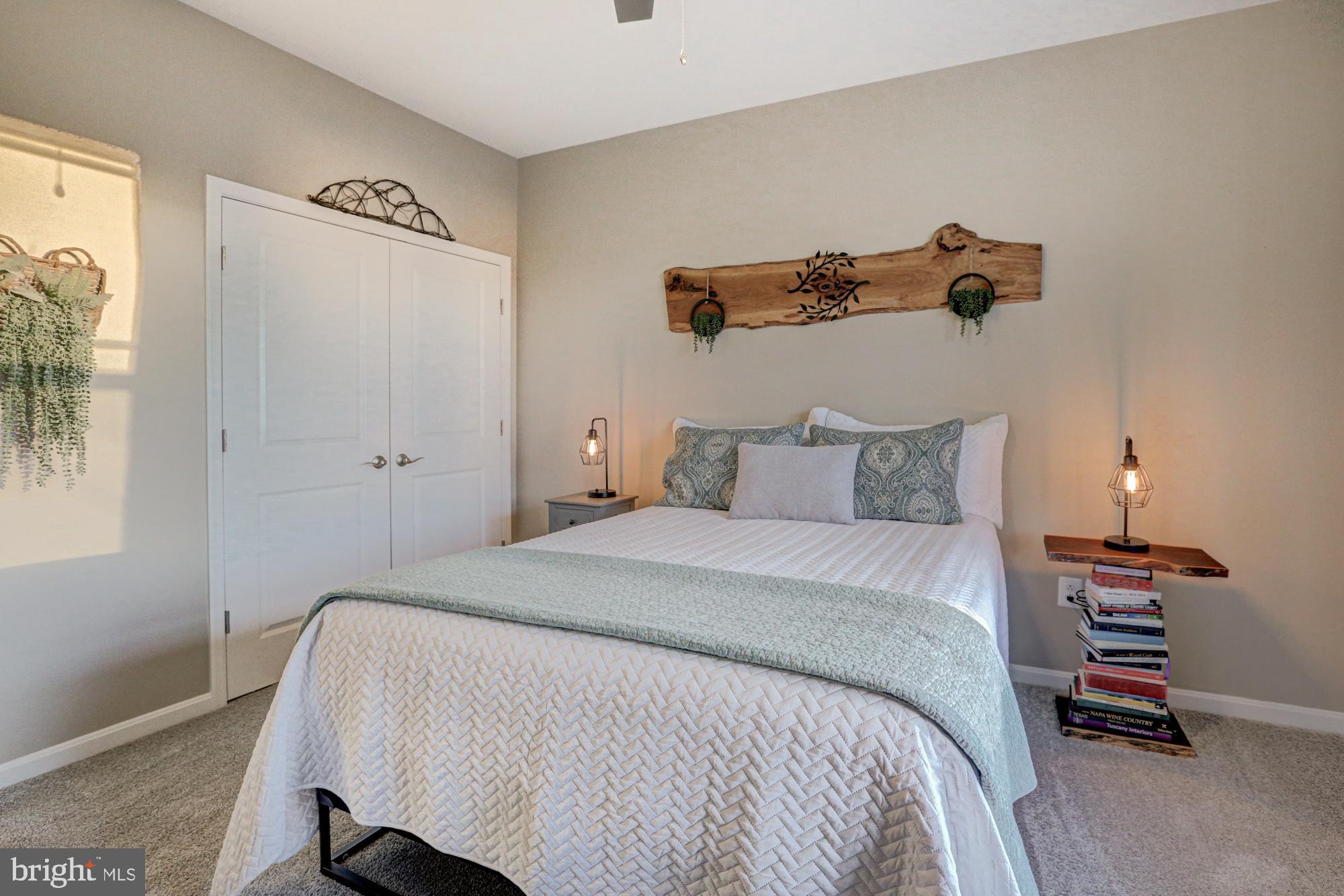 507 Cherry Bark Road Middletown, DE 19709 - Photo 53 of 81 a bedroom with a bed and a dresser