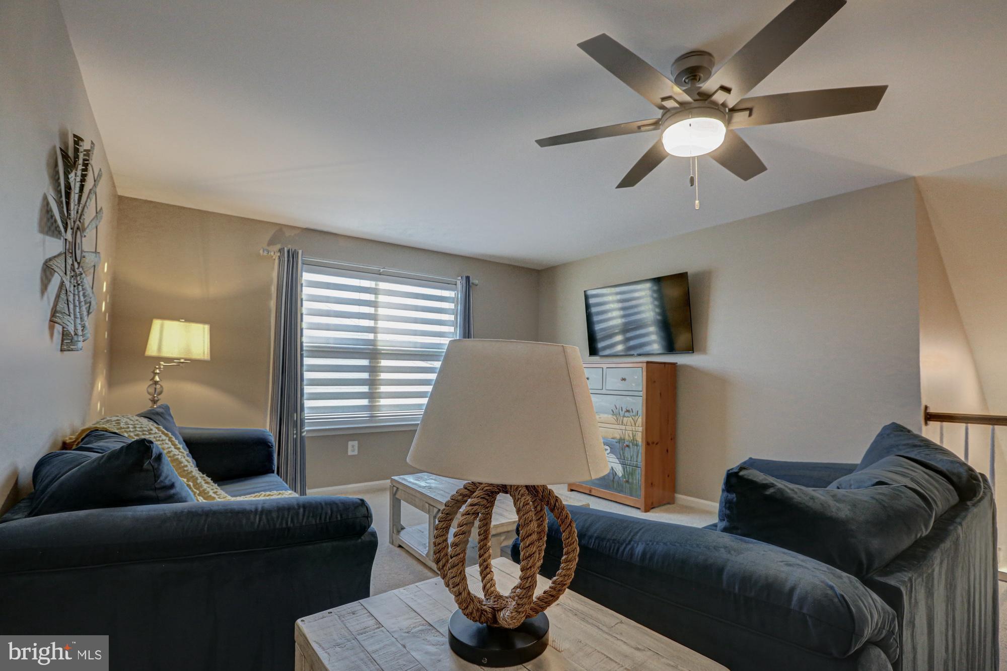 507 Cherry Bark Road Middletown, DE 19709 - Photo 59 of 81 a living room with furniture and a window