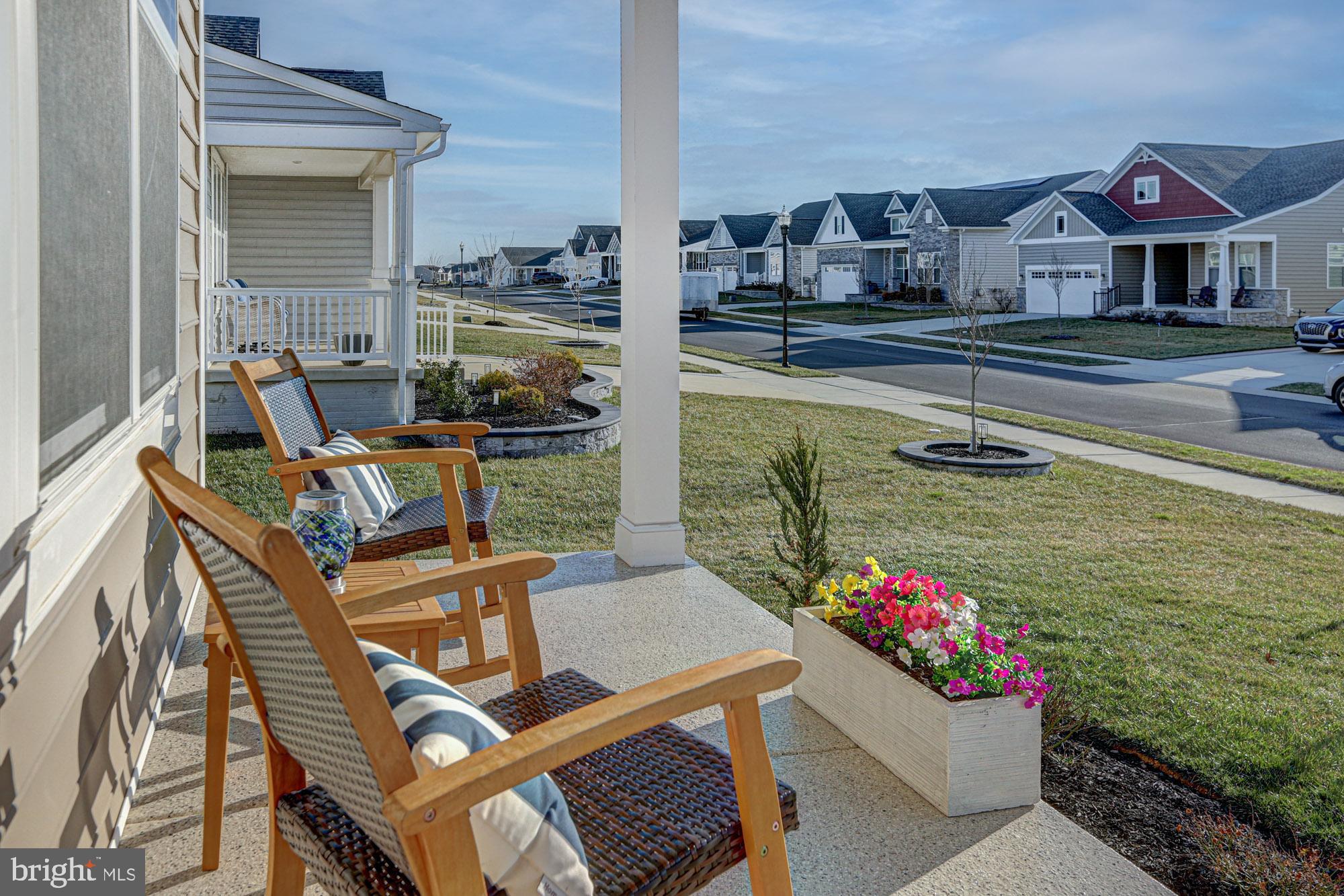 507 Cherry Bark Road Middletown, DE 19709 - Photo 6 of 81 a front view of house with outdoor seating