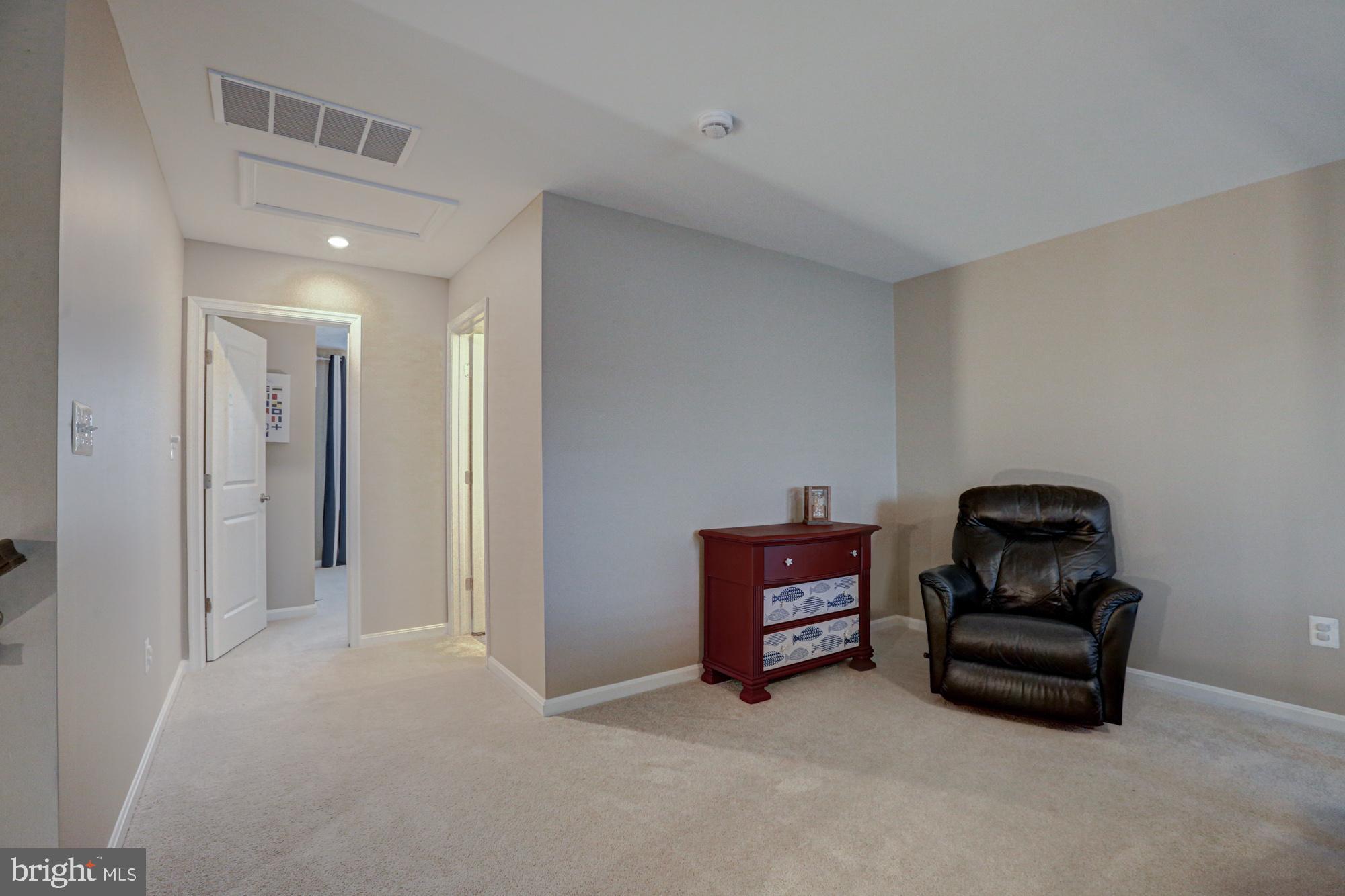 507 Cherry Bark Road Middletown, DE 19709 - Photo 62 of 81 a room with furniture and gym equipment