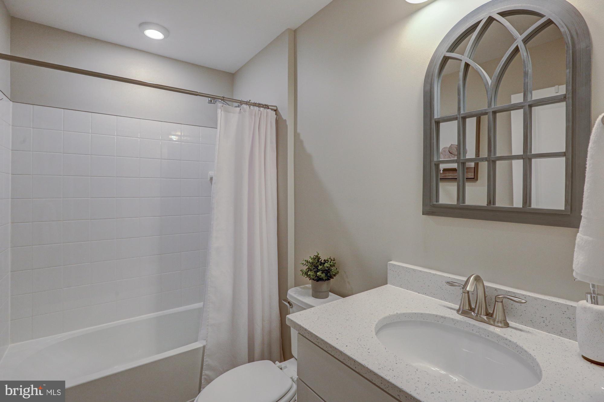 507 Cherry Bark Road Middletown, DE 19709 - Photo 63 of 81 a bathroom with a sink toilet and shower