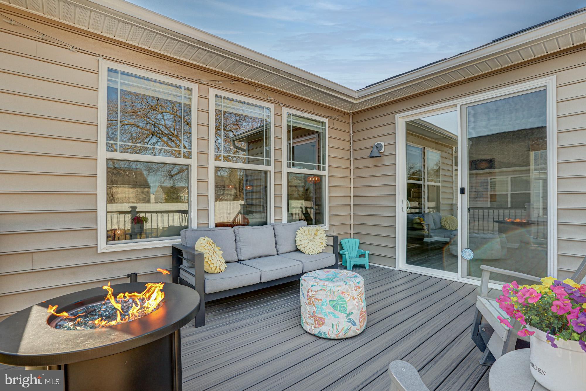 507 Cherry Bark Road Middletown, DE 19709 - Photo 66 of 81 a view of a dining room and a couch in front of house