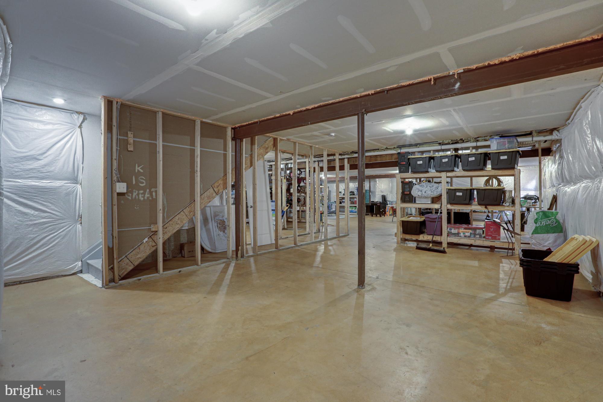 507 Cherry Bark Road Middletown, DE 19709 - Photo 74 of 81 a view of a room with wooden shelves