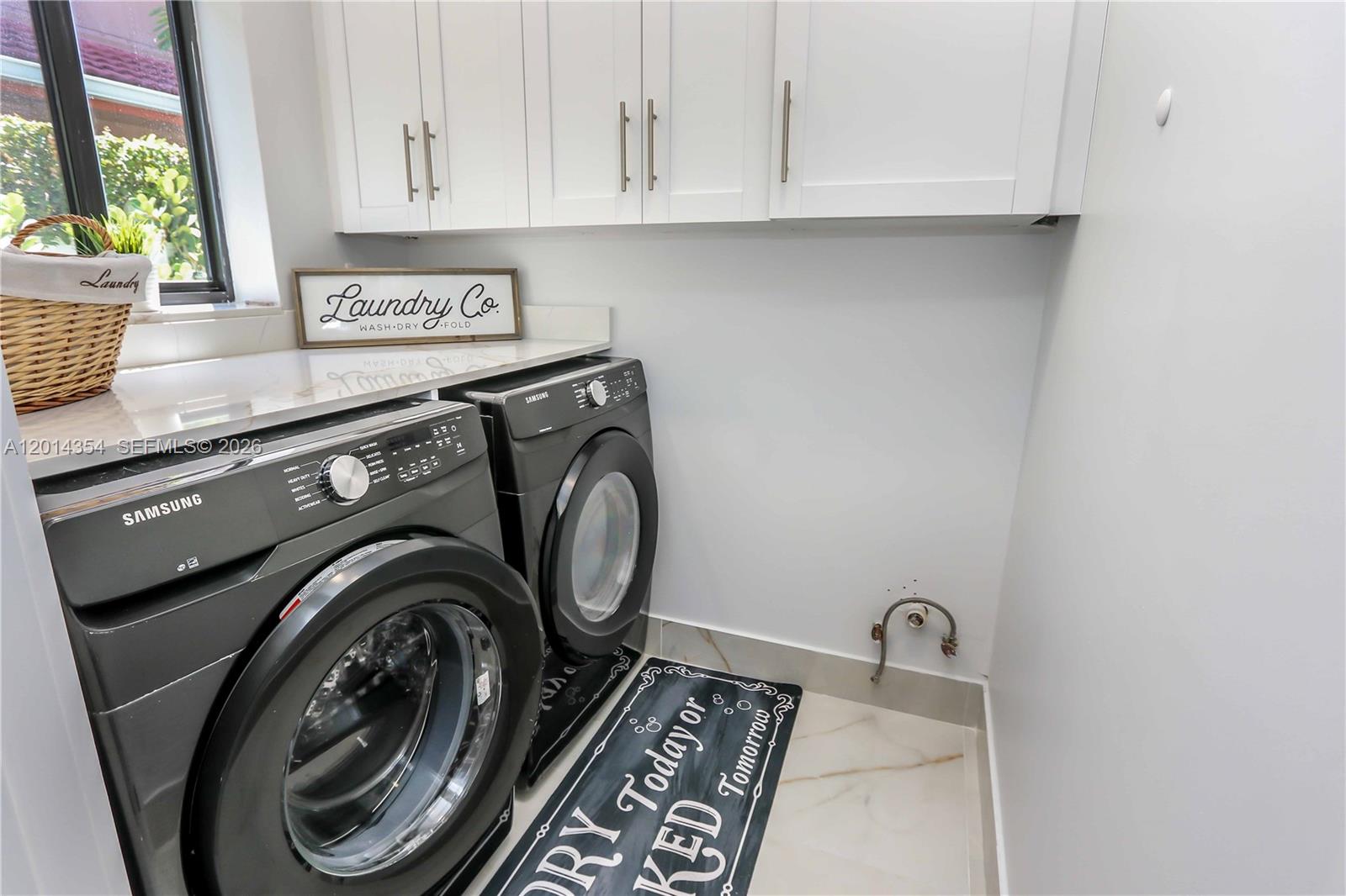 14211 Southwest 31st Street Miami, FL 33175 - Photo 27 of 27 a utility room with sink dryer and washer