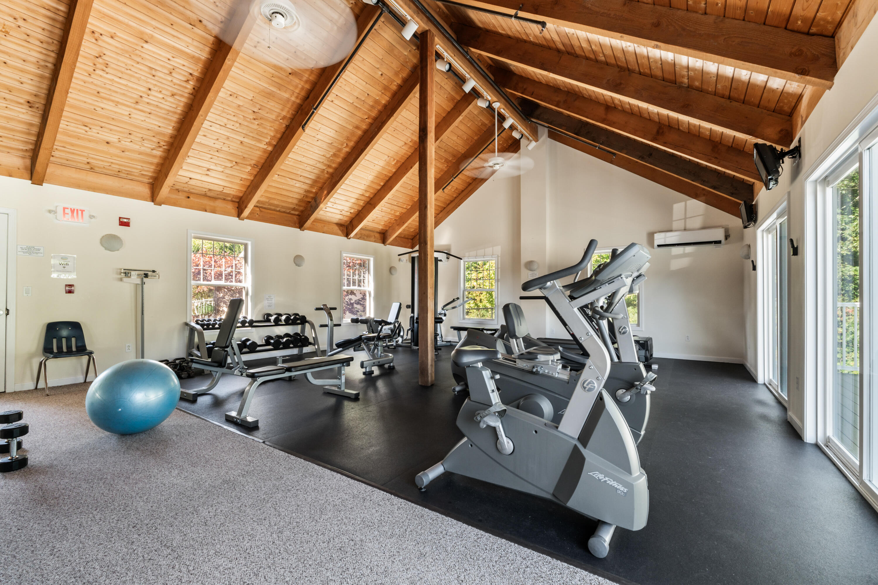 412 Post Road, Unit D4 Wells, ME 04090 - Photo 23 of 39 Gym Overlooking Pool Area