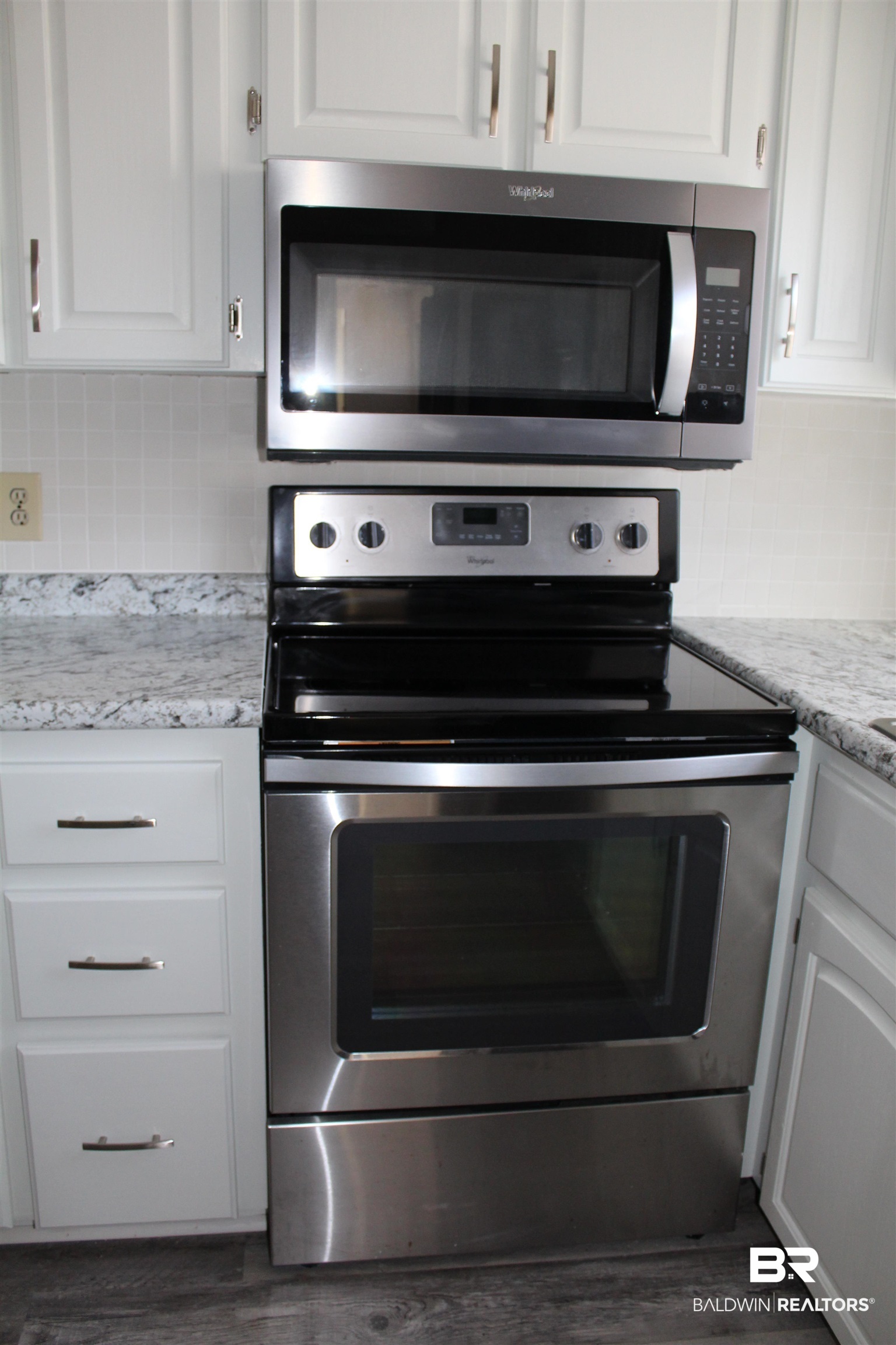 1326 Ridgewood Drive Lillian, AL 36549 - Photo 12 of 28 Stove and Microwave
