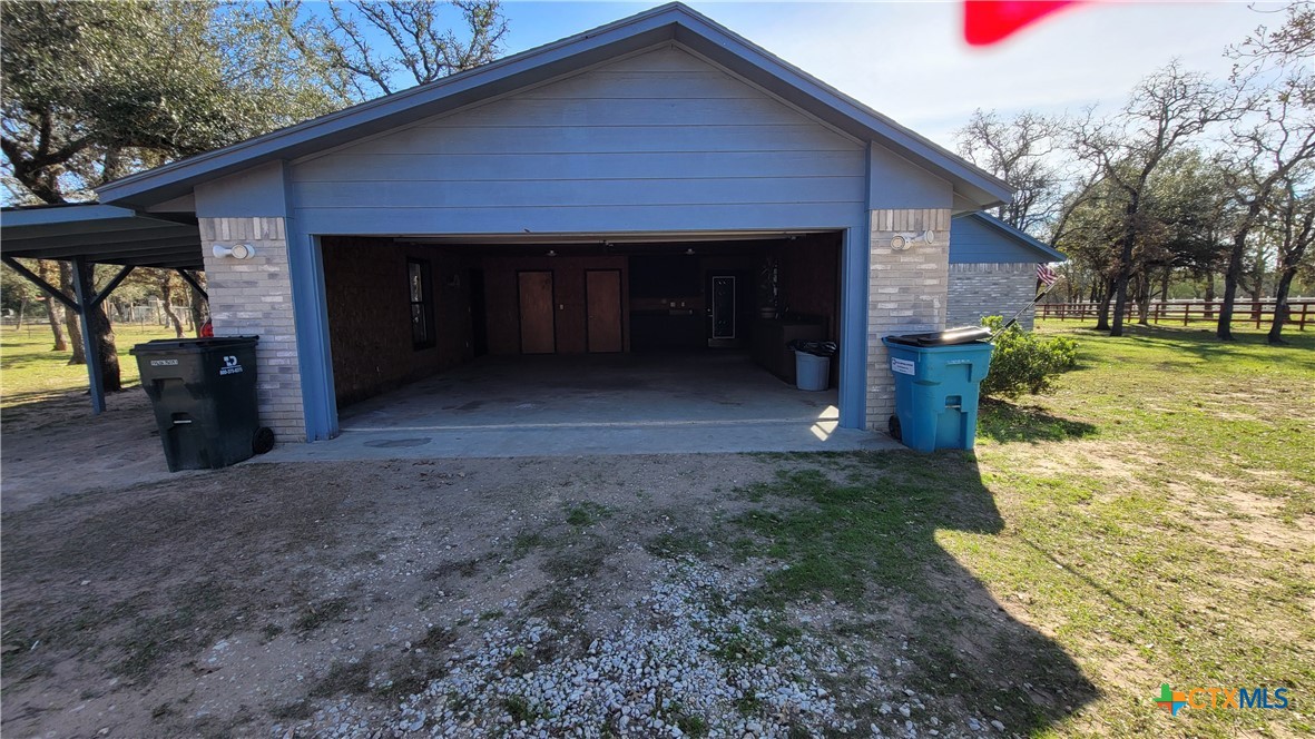 127-129 McAdams Road Goliad, TX 77963 - Photo 4 of 33 a house view with a backyard space