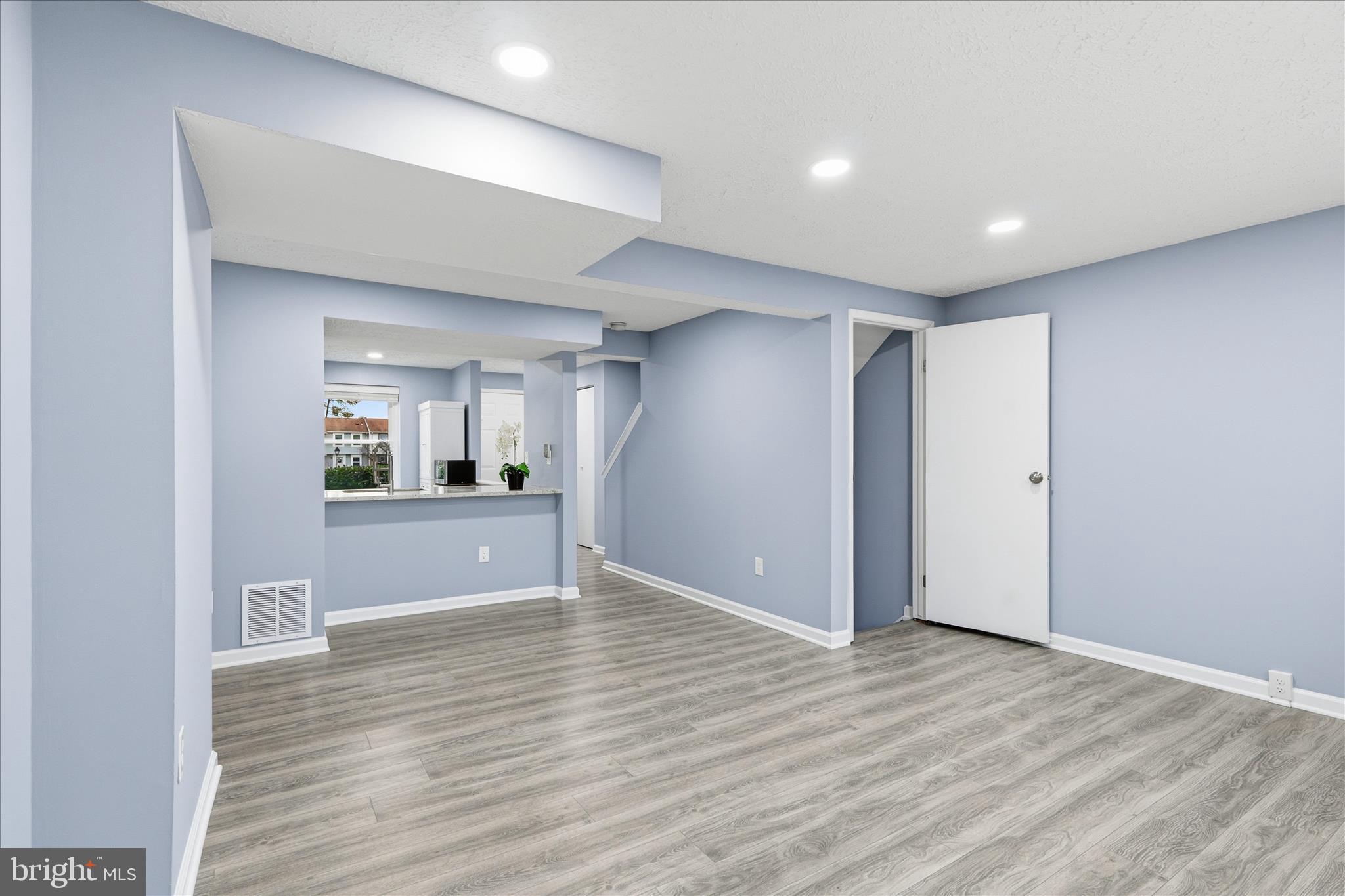 307 Brethour Court Sterling, VA 20164 - Photo 11 of 43 a view of livingroom with wooden floor