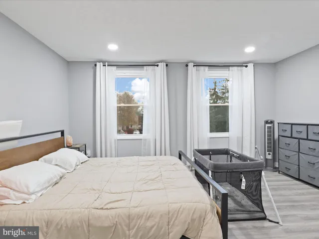 a very nice looking room with wooden floor