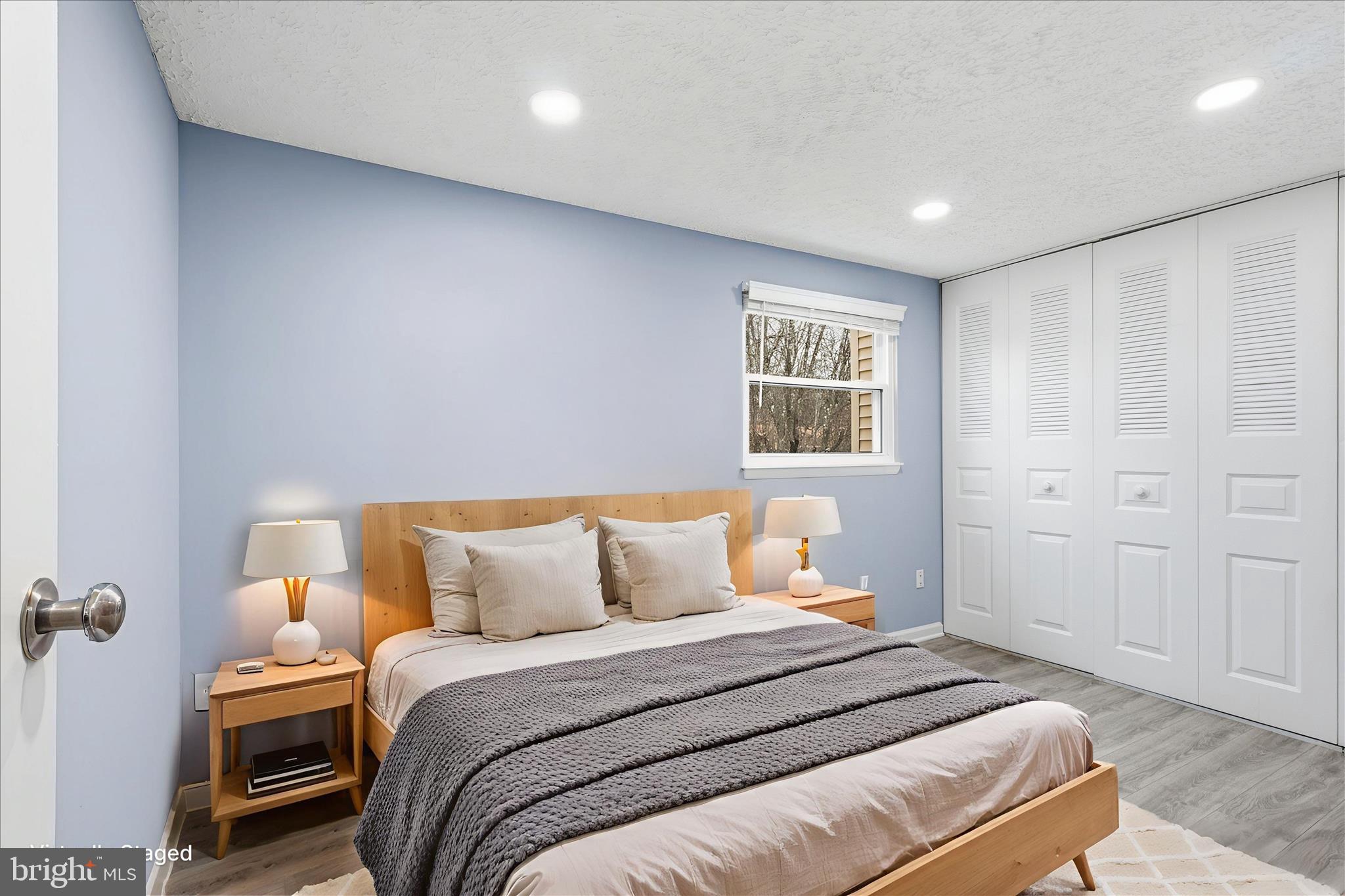 307 Brethour Court Sterling, VA 20164 - Photo 16 of 43 a bedroom with a bed and a window