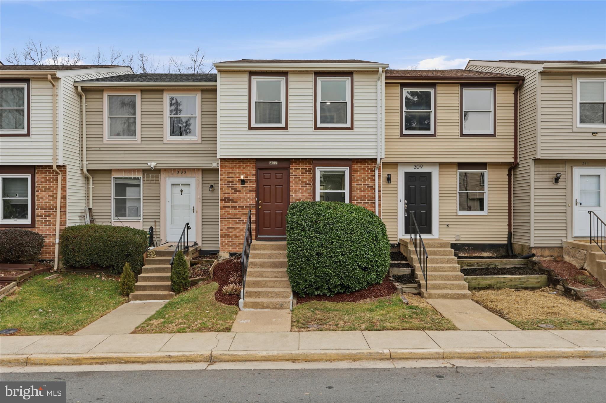 307 Brethour Court Sterling, VA 20164 - Photo 3 of 43 a front view of a house