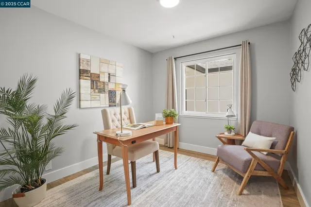 a workspace with furniture window and wooden floor