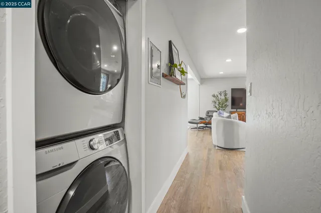 a view of a kitchen with washer and dryer
