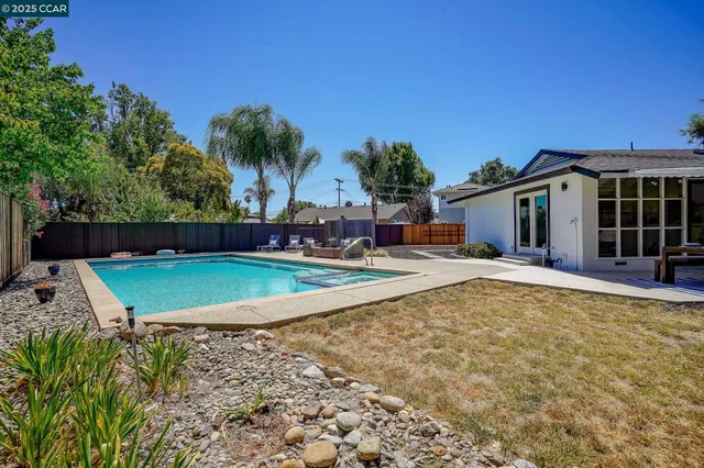 a view of outdoor space yard and swimming pool