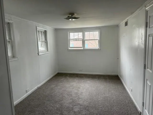 an empty room with a window