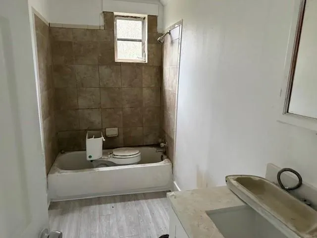 a bathroom with a sink and a bathtub