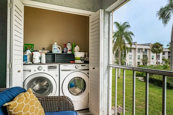 a view of living room washer and dryer