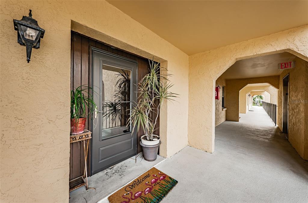 8699 Bardmoor Boulevard, Unit 203 Seminole, FL 33777 - Photo 2 of 14 a view of livingroom with furniture and windows