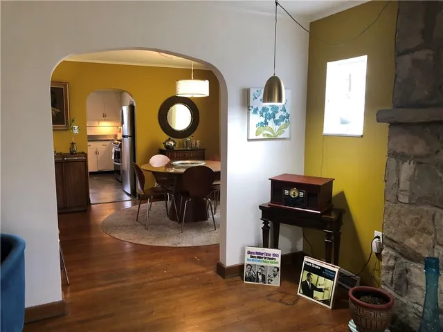 a kitchen with stainless steel appliances a stove a refrigerator and cabinets