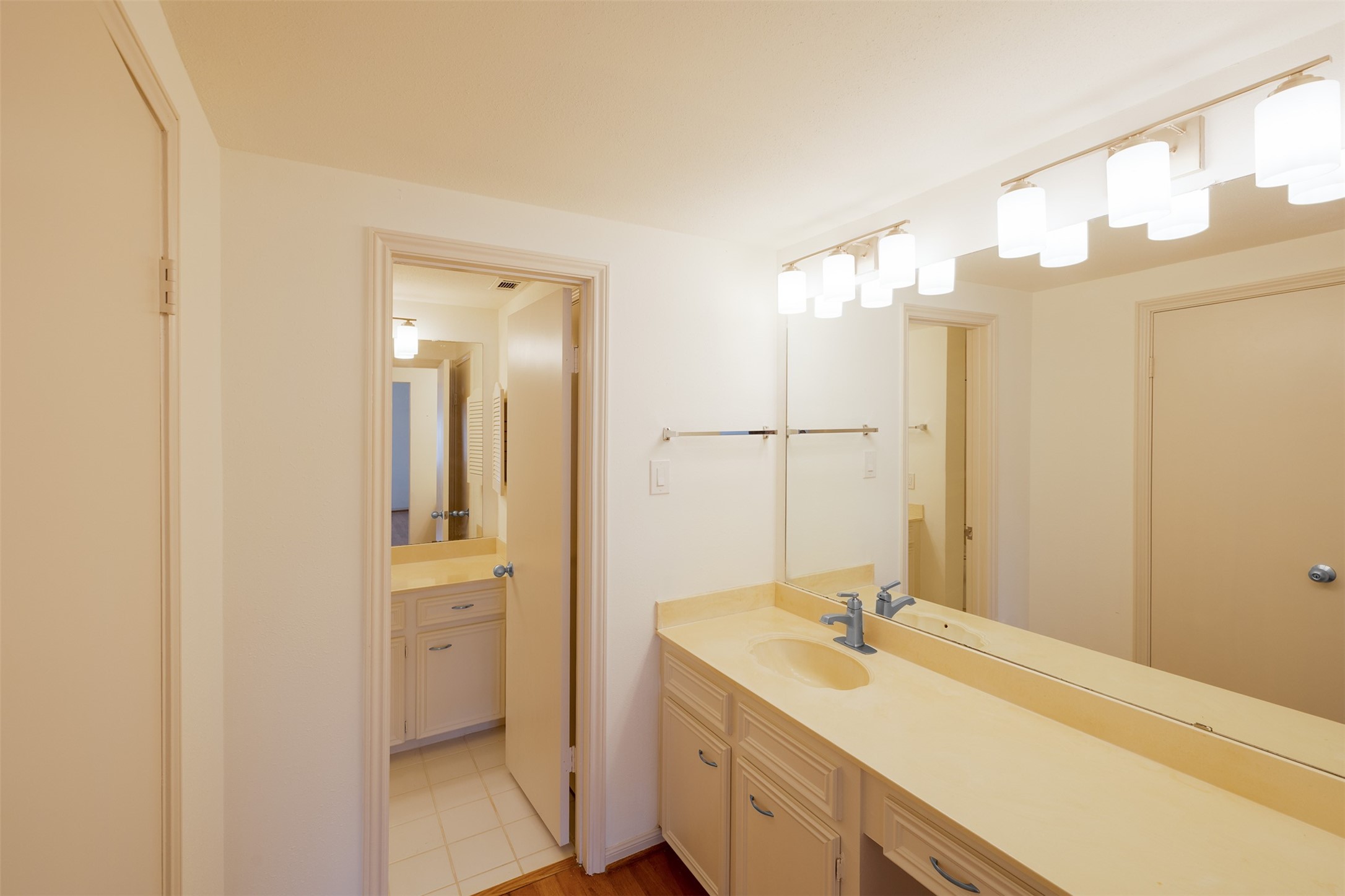 135 April Point Drive South Conroe, TX 77356 - Photo 27 of 45 The vanities are set apart from the shower area for convenience and privacy.