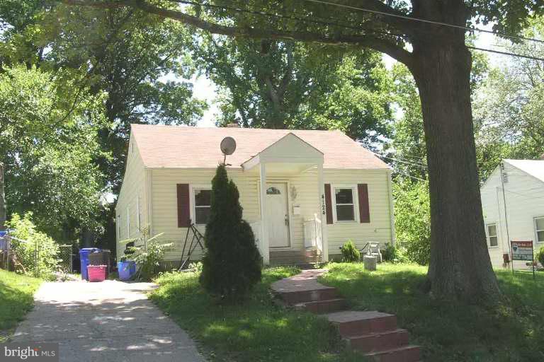 4124 Sampson Road Silver Spring, MD 20906 - Photo 1 of 1 a view of a house with a yard