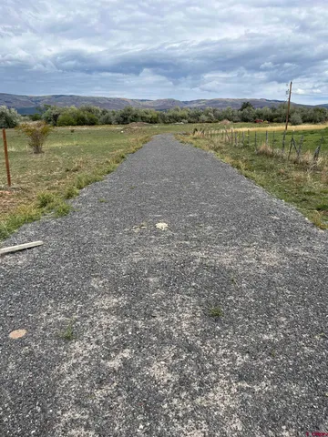 a view of a lake with a city