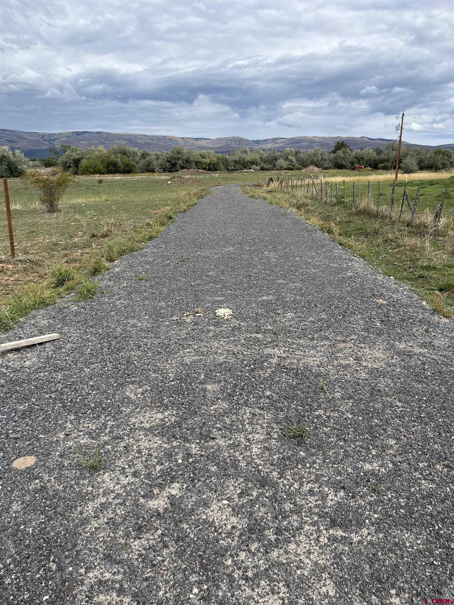 1006 Southwest 11th Avenue Cedaredge, CO 81413 - Photo 2 of 11 a view of a lake with a city