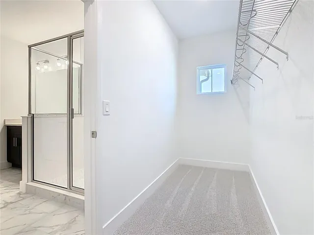 a view of a house with a door and a window