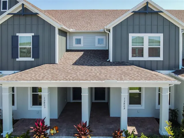 a kitchen with stainless steel appliances granite countertop a stove and a refrigerator