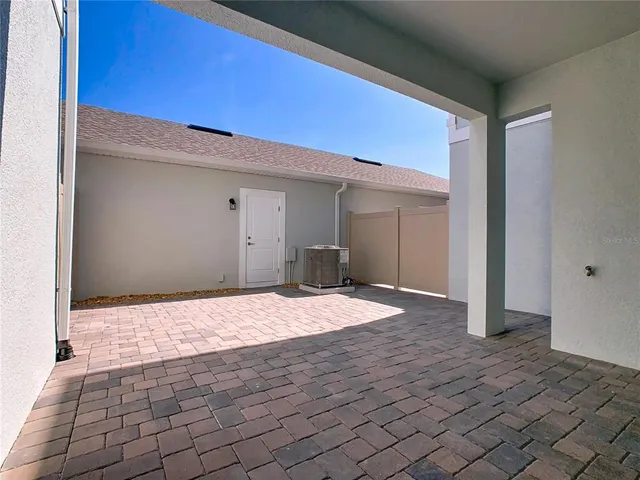 a view of outdoor space with playground and green space