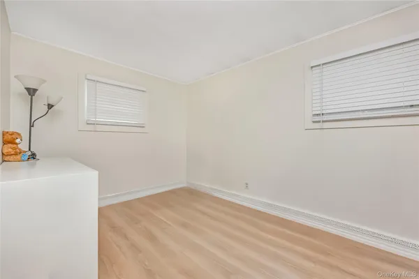 a view of a room that has a window in it