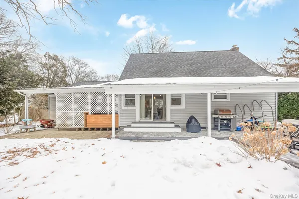 a front view of a house with a patio