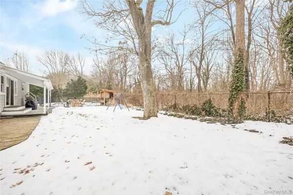 a view of a snow with snow on the road
