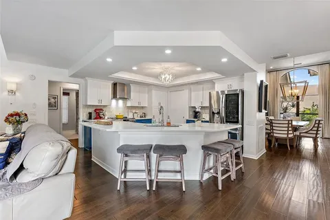 a bedroom with a bed and glass window