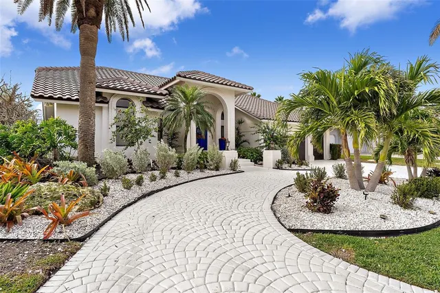 a view of a house with a swimming pool