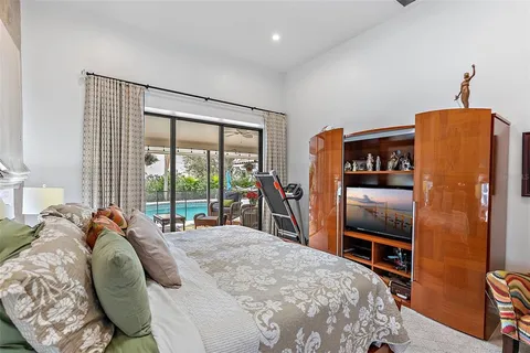 a bathroom with a granite countertop sink vanity and mirror