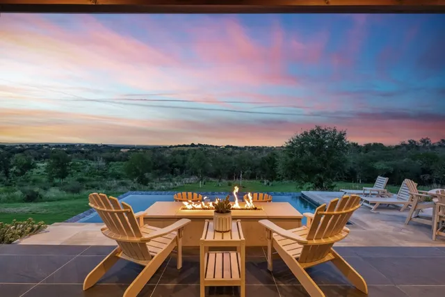 a view of a chairs and table on the terrace