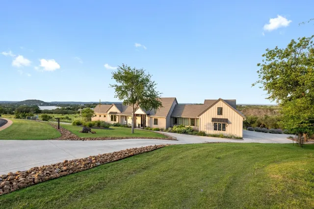 a view of a house with a big yard
