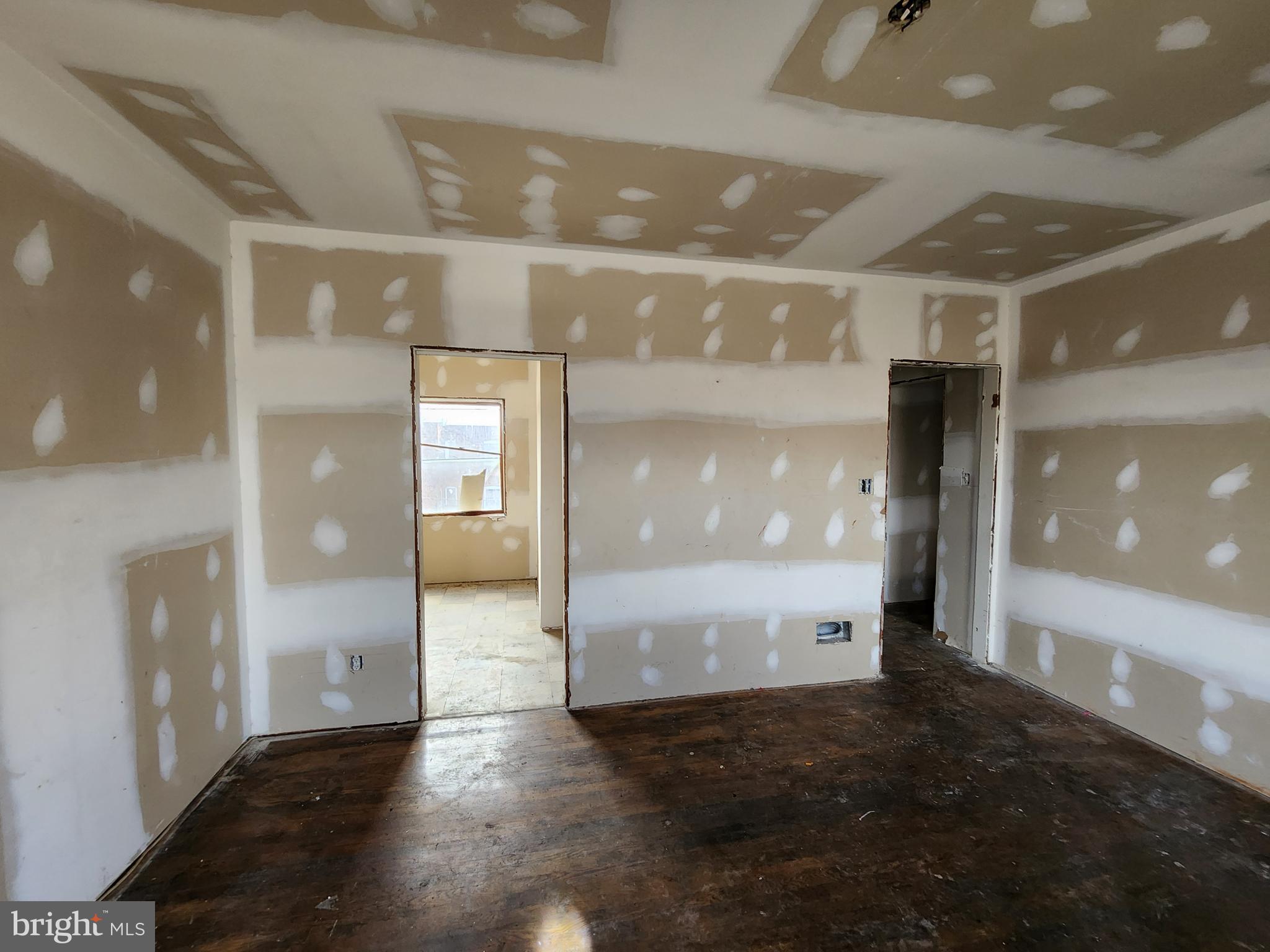 3425 6th Street Baltimore, MD 21225 - Photo 25 of 35 a view of a hallway with wooden floor