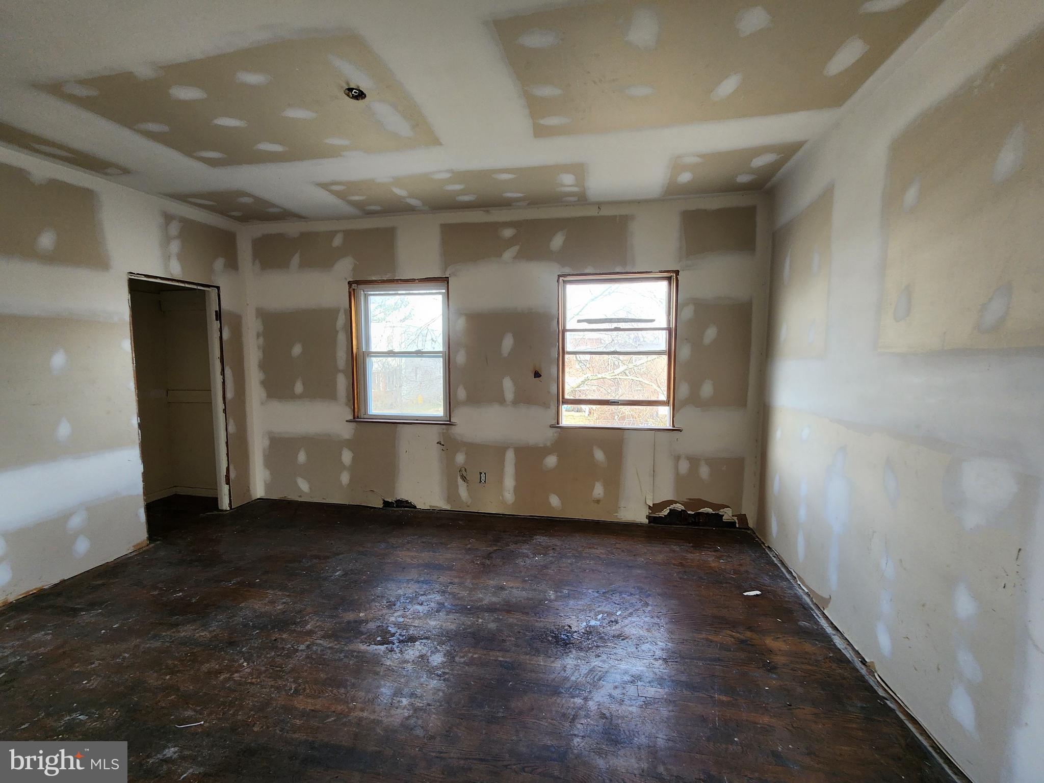 3425 6th Street Baltimore, MD 21225 - Photo 28 of 35 a view of an empty room and a window
