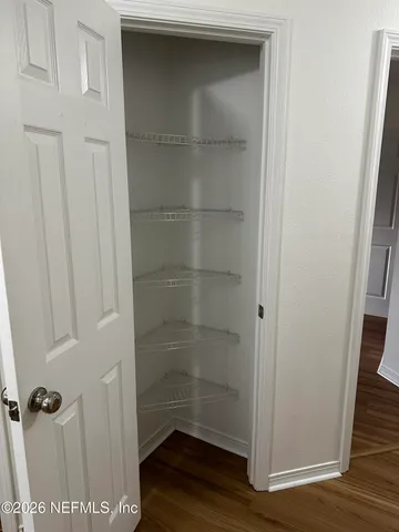 a bathroom with a glass door shower