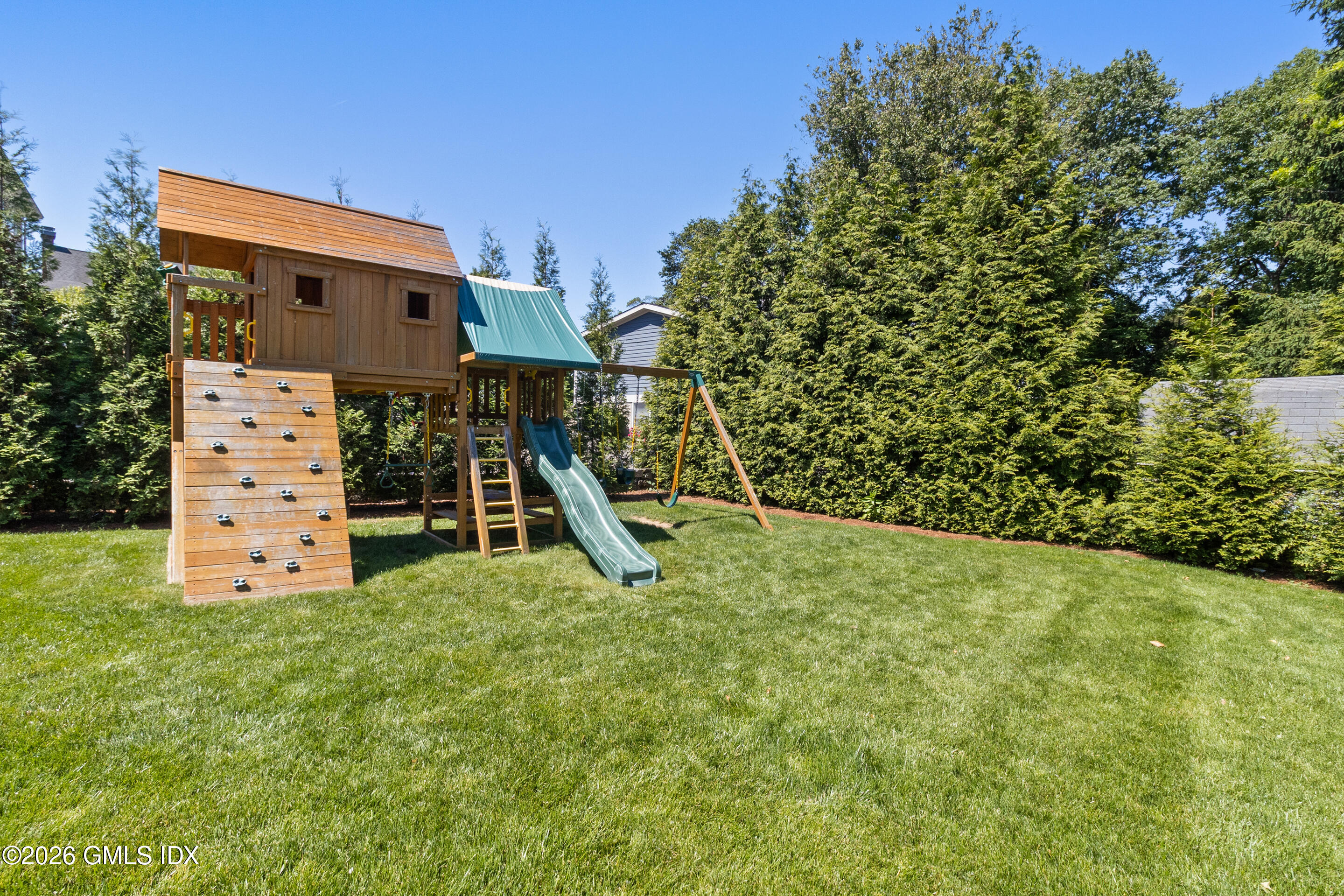 9 Deluca Drive Cos Cob, CT 06807 - Photo 26 of 30 a view of backyard with a small cabin