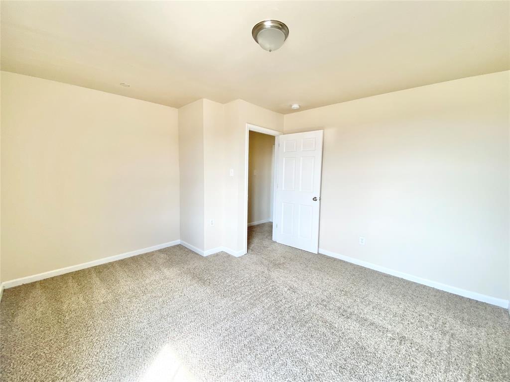 8001 C Rothington Road, Unit 21 Dallas, TX 75227 - Photo 16 of 32 a view of an empty room