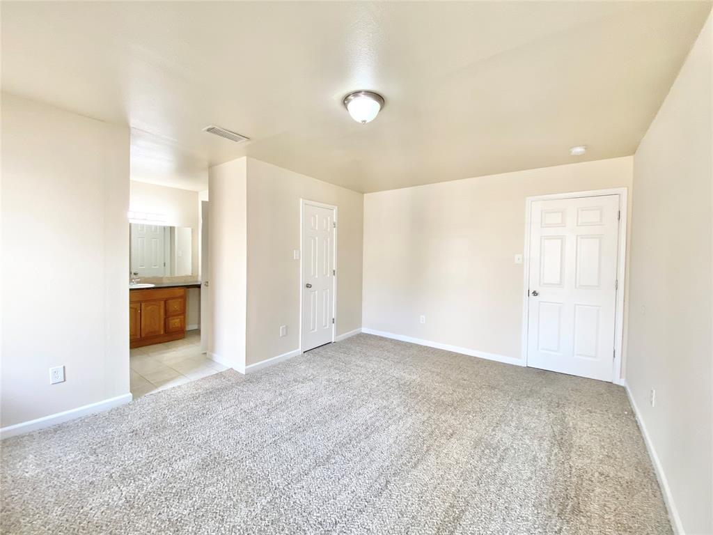 8001 C Rothington Road, Unit 21 Dallas, TX 75227 - Photo 23 of 32 a view of an empty room