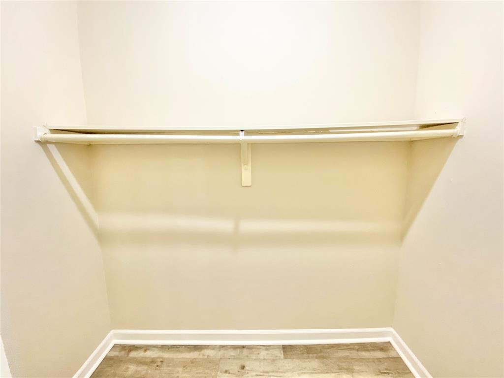 8001 C Rothington Road, Unit 21 Dallas, TX 75227 - Photo 29 of 32 a view of a room with an empty space