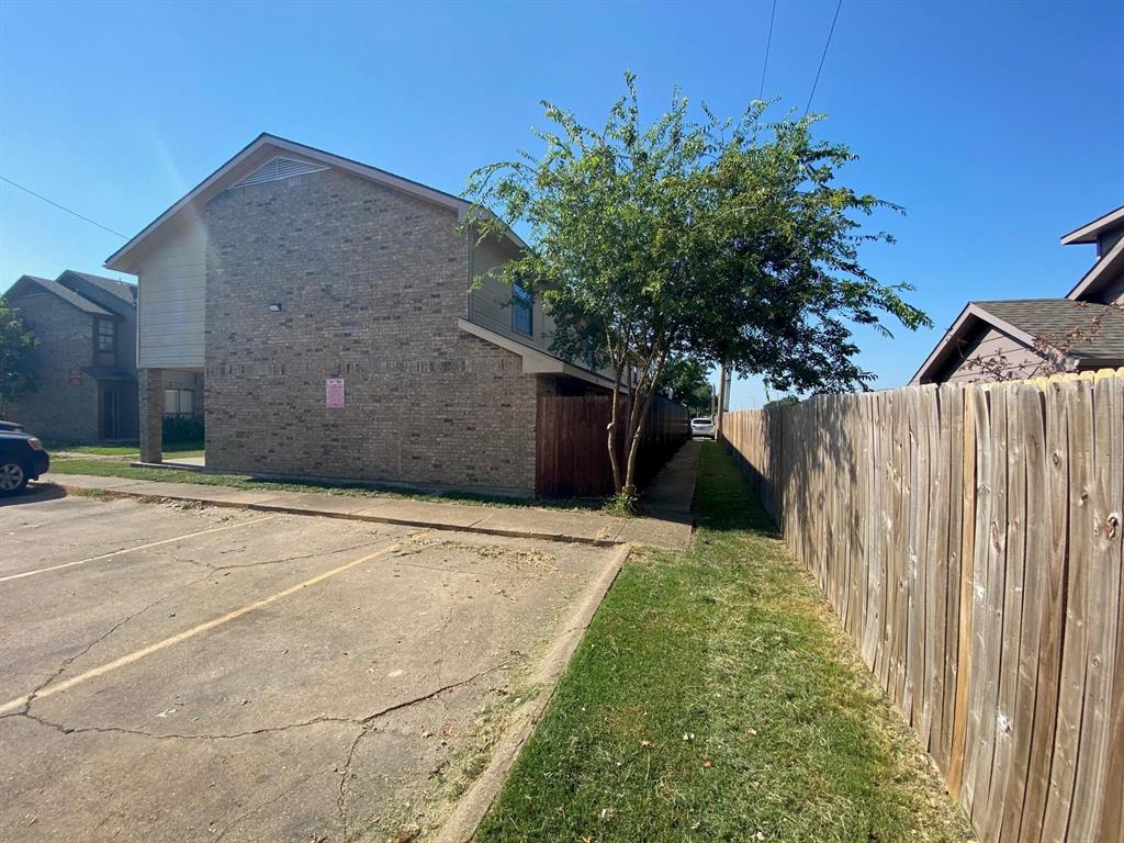 8001 C Rothington Road, Unit 21 Dallas, TX 75227 - Photo 32 of 32 a house view with a garden space