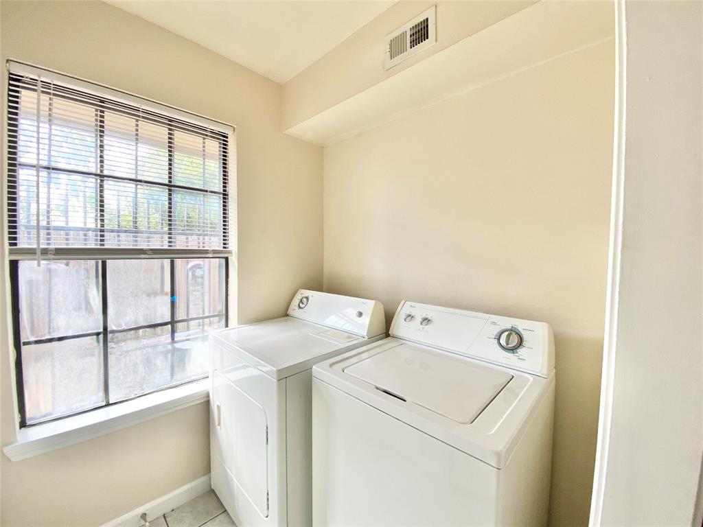 8001 C Rothington Road, Unit 21 Dallas, TX 75227 - Photo 10 of 32 a utility room with dryer and washer